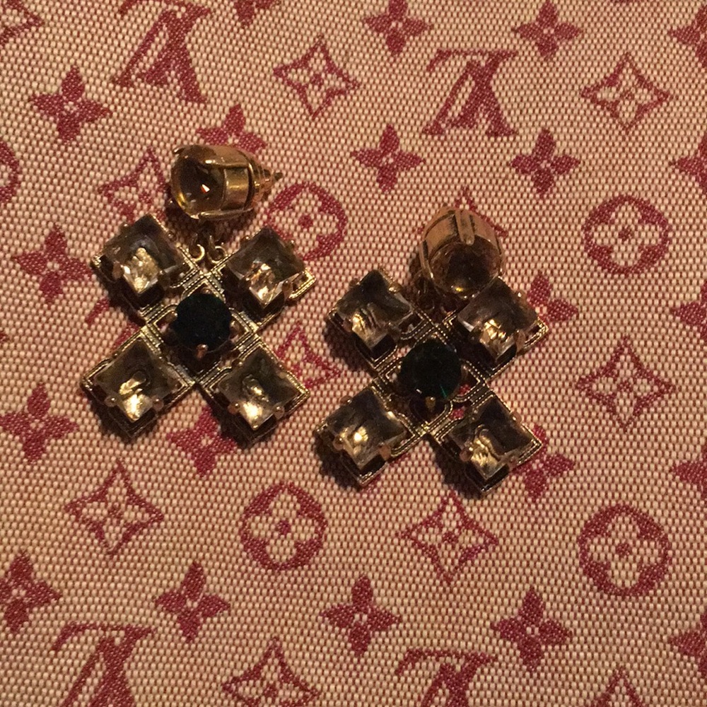 Tory Burch earring.